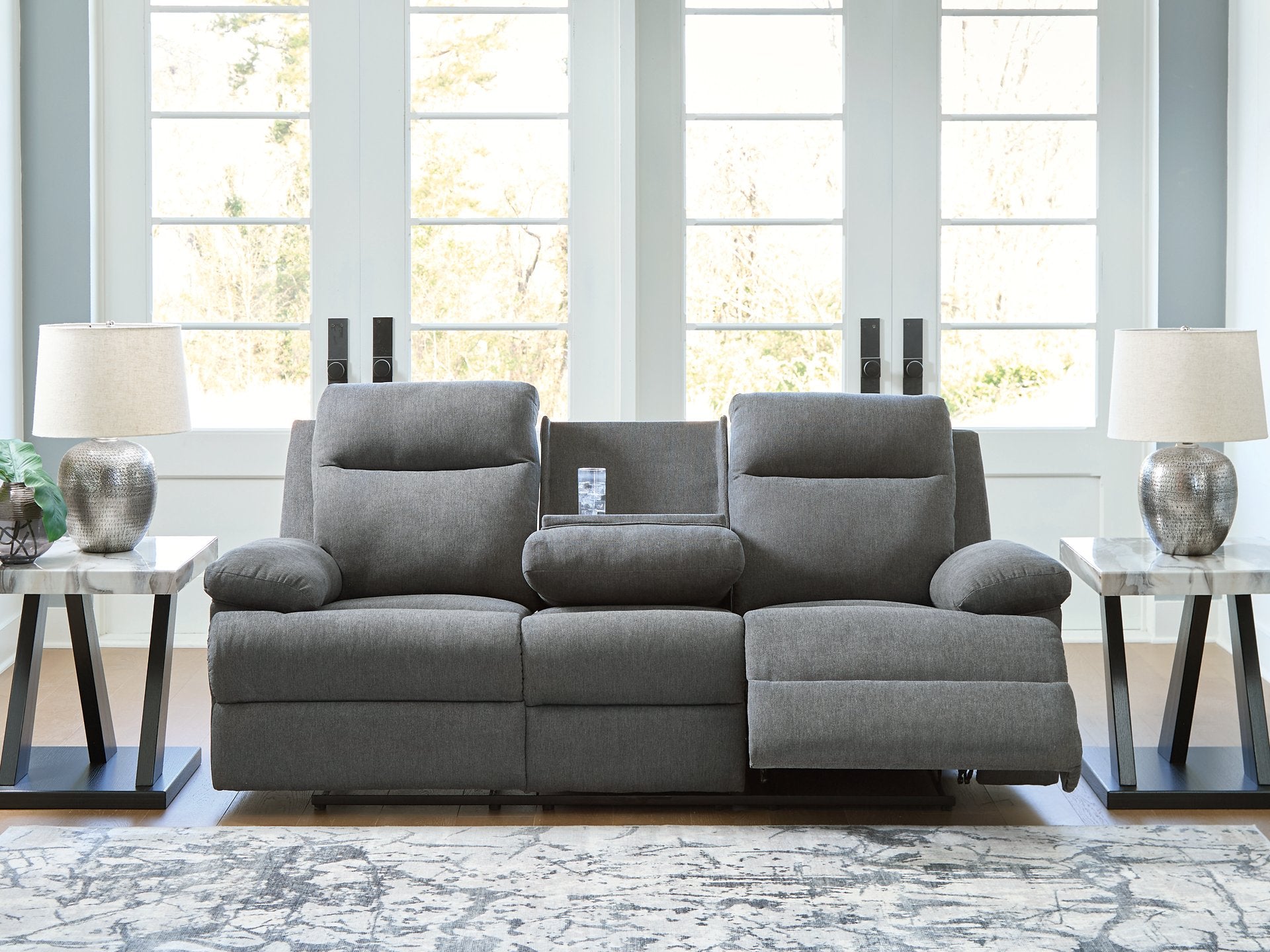 Side-Swipe Reclining Sofa with Drop Down Table